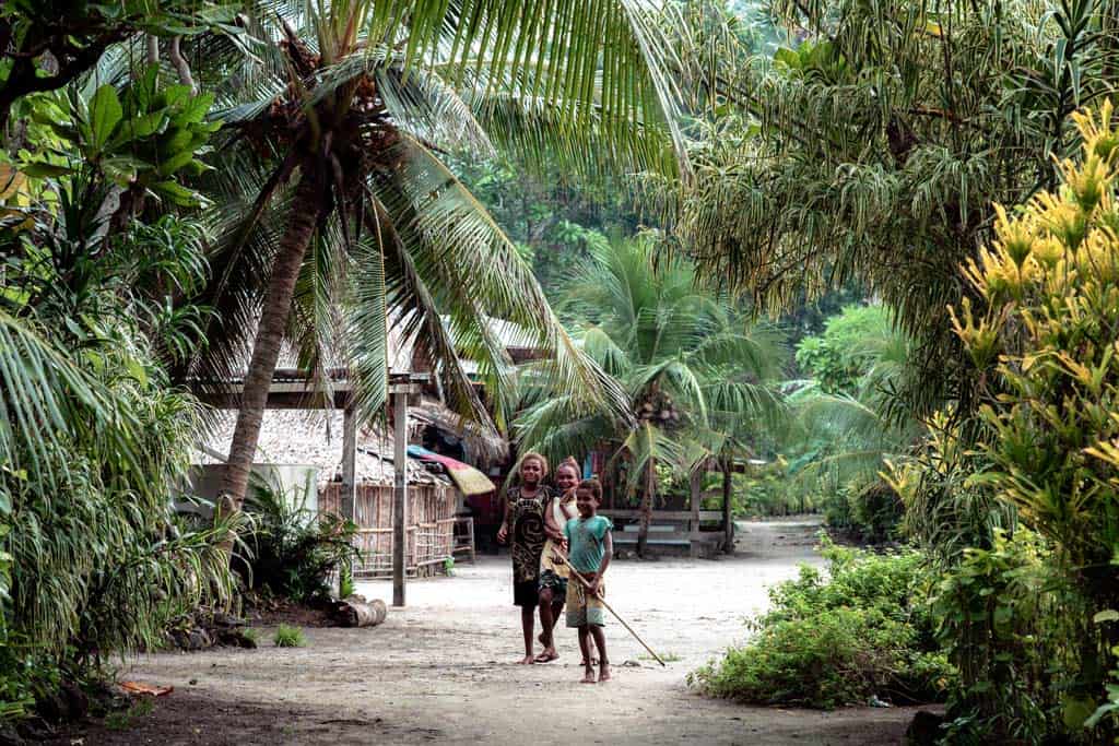 Waving Kids In Village