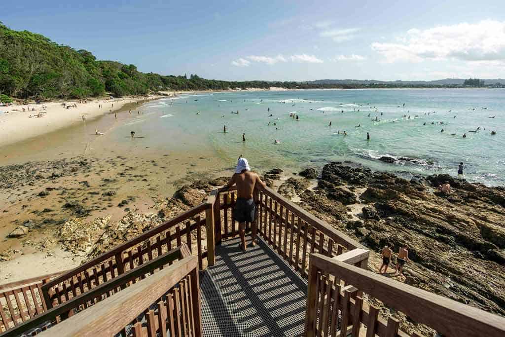 Person Walking On Stairs At Byron Bay Beach
