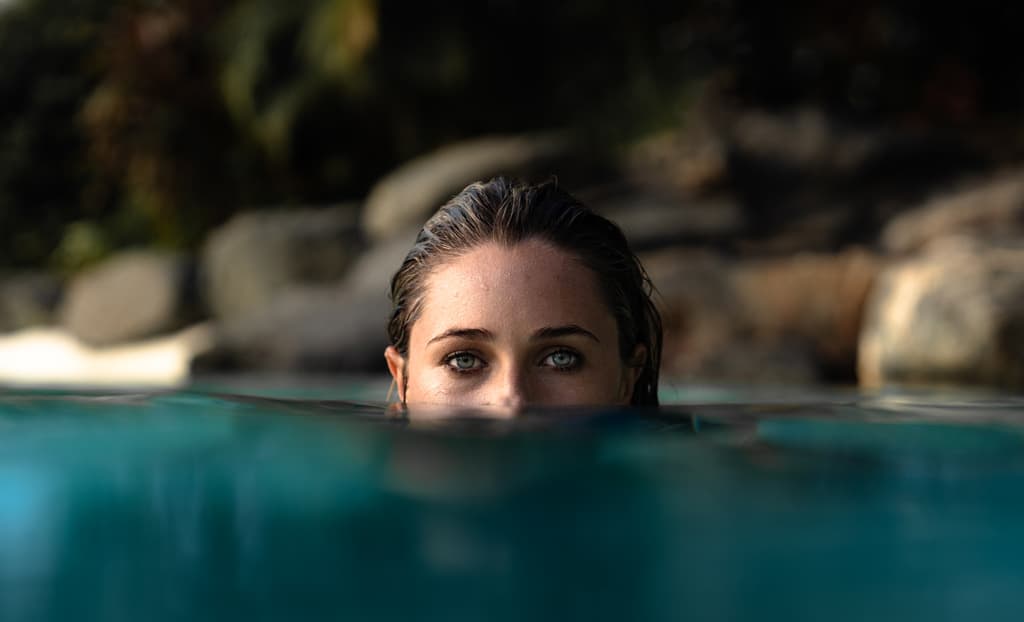 Woman In Water Staring Review Of Luminar Neo