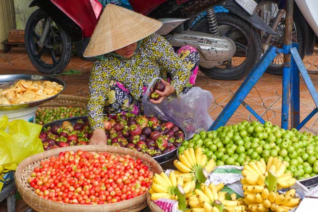 This Image Has An Empty Alt Attribute; Its File Name Is Vietnamese-Market-Lady-1024X683.Jpg