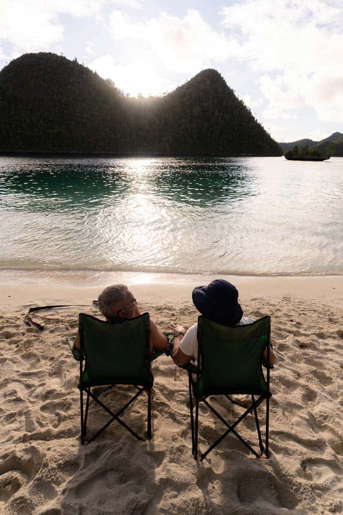 Couple With Hill In Front. 